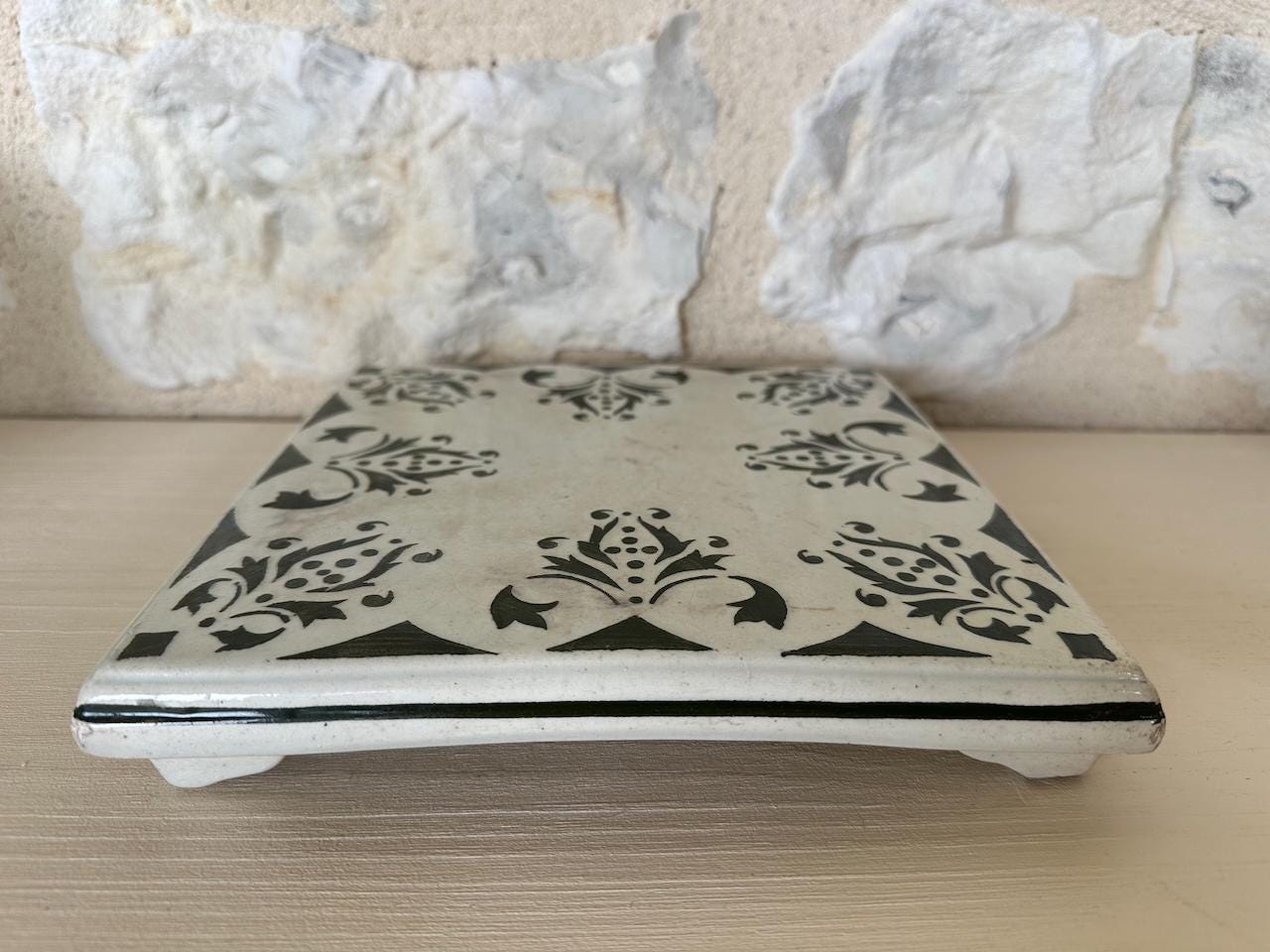 Antique French Footed Terre de Fer Hot Plate