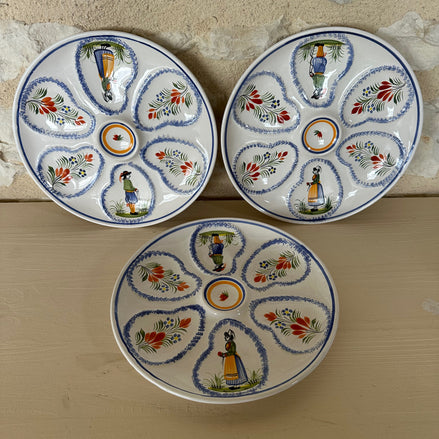A Set of Three Henriot Quimper Six Piece Oyster Plates