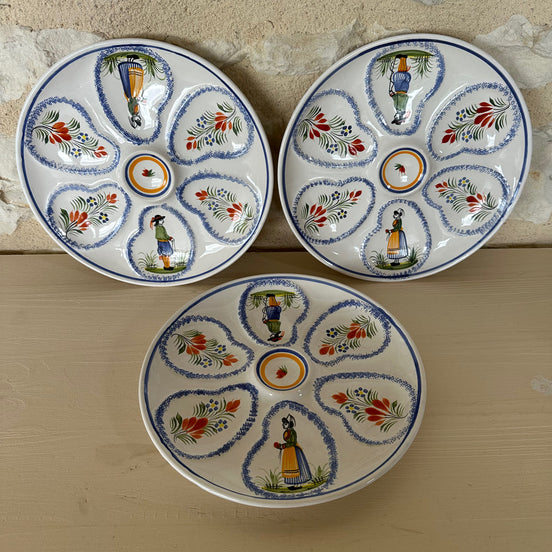 A Set of Three Henriot Quimper Six Piece Oyster Plates