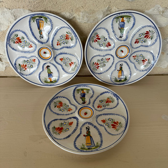 A Set of Three Henriot Quimper Six Piece Oyster Plates