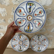 A Set of Three Henriot Quimper Six Piece Oyster Plates
